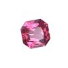 Close-up of a pink faceted gemstone with multiple sparkling facets against a white background