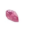 Close-up of a faceted pink gemstone on a white background, showing its angular facets and reflections.