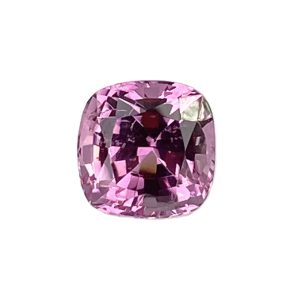 Close-up of a faceted pink-purple gemstone with an oval cut on a white background, showcasing many facets and a shiny surface.