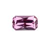 Fspin 239_2 - GEMWORLD LTD Close-up of a faceted pink-purple gemstone on a white background, showing angular facets and a square-ish octagonal shape.