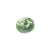 Green faceted glass ball with numerous reflective facets catching light