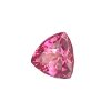 Close-up of a pink faceted gemstone in a teardrop shape, showing light reflections on the facets.