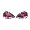 Tour 124125_3 - GEMWORLD LTD Two large faceted pink gemstone hearts partially visible at the bottom of the frame.