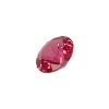 PSpin 118_5 - GEMWORLD LTD Close-up of a pink, oval-cut faceted gemstone on a white background, showing multiple facets and refractions.