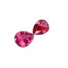 PSpin 138_5 - GEMWORLD LTD Three pink faceted gemstones arranged diagonally on a white background for a jewelry-themed image.
