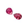 PSpin 138_6 - GEMWORLD LTD Three pink faceted gemstone beads arranged diagonally on a white background, showing sparkly facets.