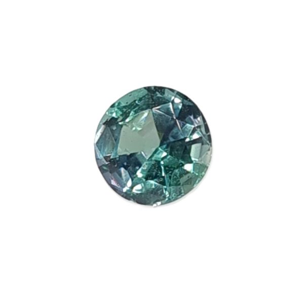 Round faceted teal gemstone sparkling with blue-green hues in a brilliant-cut facet