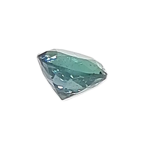 Teal blue emerald-cut diamond gemstone viewed at a slight angle