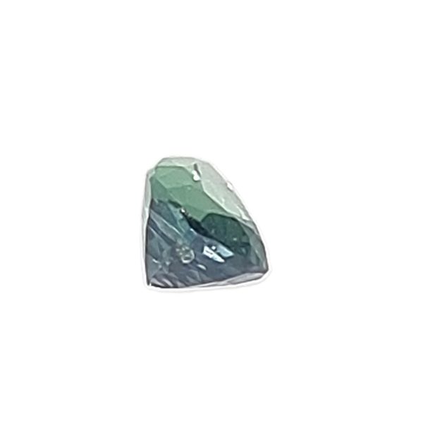 Korn 19_4 - GEMWORLD LTD Emerald-green crystal shard with jagged facets on a white background.