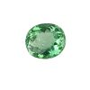 Par 16_2 - GEMWORLD LTD Green faceted gemstone sphere on a white background, close-up view of the emerald-like ball.