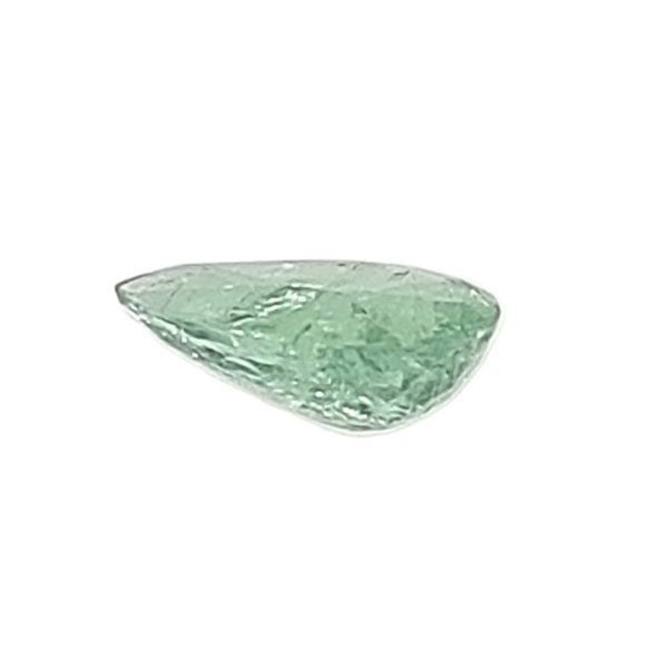 Par 36d_6 - GEMWORLD LTD Loose pale green gemstone with a rough, faceted surface on a white background