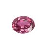 Tour 128_1 - GEMWORLD LTD Close-up of a faceted pink gemstone ball on a white background, showing many angular facets and a rich magenta color.