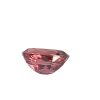 Tour 128_3 - GEMWORLD LTD Close-up of a faceted pink gemstone with multiple angular facets against a white background.
