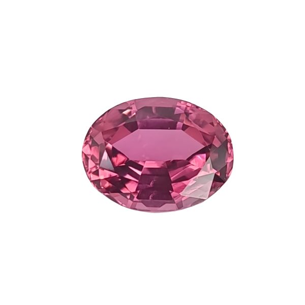 Tour 128_7 - GEMWORLD LTD Close-up of a pink faceted gemstone sphere against a white background at the bottom edge of the frame.