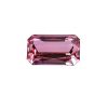 Tour 129_1 - GEMWORLD LTD Close-up of a pink rectangular-cut gemstone showing faceted surfaces and sharp edges. It resembles a pink ruby or pink sapphire gem with brilliant facets.