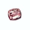 Tour 130_6 - GEMWORLD LTD Close-up of a faceted pink gemstone occupying the lower portion of the frame against a white background, highlighting its facets and pink hues.