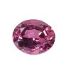Partial view of a pink faceted gemstone with a rounded dome shape and reflective facets in a deep magenta hue.