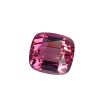 Tour 2_1 - GEMWORLD LTD Close-up of a faceted pink-red gemstone with multiple angular facets in a rounded oval shape, resembling a ruby jewel