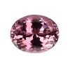 Tour 36_1 - GEMWORLD LTD Partial view of a pink faceted gemstone sphere, close-up showing sparkling facets.
