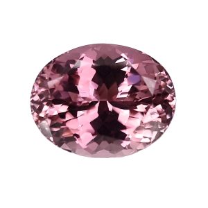 Partial view of a pink faceted gemstone sphere, close-up showing sparkling facets.