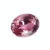Tour 36_6 - GEMWORLD LTD Close-up of a pink faceted gemstone sphere with many angular facets against a light background