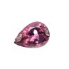 Tour 52_2 - GEMWORLD LTD Close-up of a faceted pink gemstone with multiplereflective facets and a teardrop shape, catching light from the side.