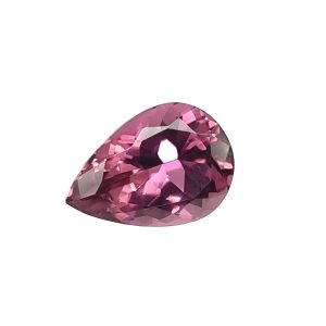 Close-up of a faceted pink gemstone with multiplereflective facets and a teardrop shape, catching light from the side.