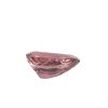 Tour 52_6 - GEMWORLD LTD Partial view of a pink faceted gemstone on a white background