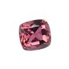 Close-up of a faceted pink gemstone catching the light.